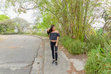Karin Torres – Latina Brunette Sits on a Swing in Ripped Jeans