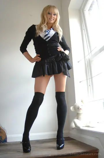 Blonde in Lingerie Uniform Poses Topless