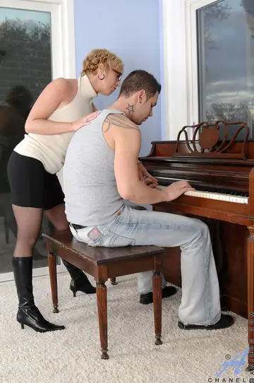 Chanel Carrera – Mature Blonde in Stockings and Boots Takes Anal and a Facial at the Piano