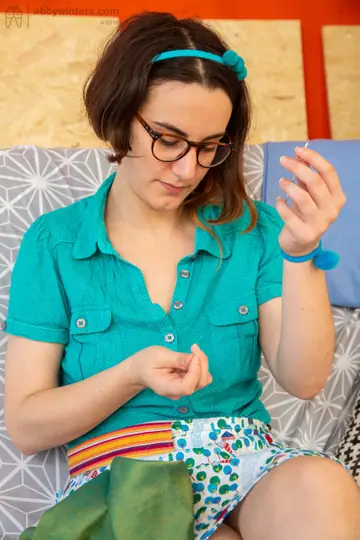 Nerdy Brunette with Glasses Shows Her Hairy Armpits and Pussy
