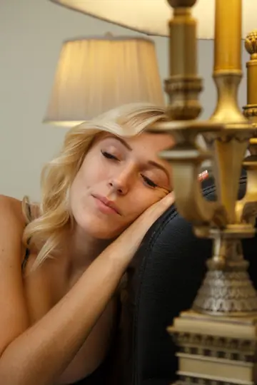 Tanned Blonde Pulls Panties Aside and Fingers Her Pussy in Lingerie on the Bed