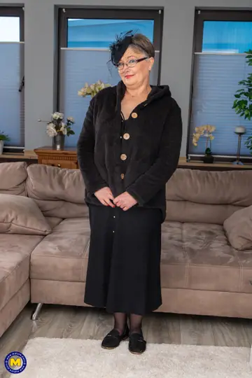 Mature European Woman in Glasses Strips to Lingerie