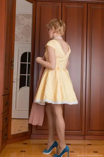Slim Mature Redhead Sheds Her Yellow Dress to Reveal Her Hairy Pussy