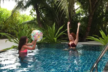 Katty West – Russian Brunette and Redhead Lesbians Fuck with a Dildo in the Pool