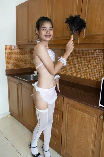 Petite Thai Babe Spreads Her Shaved Pussy