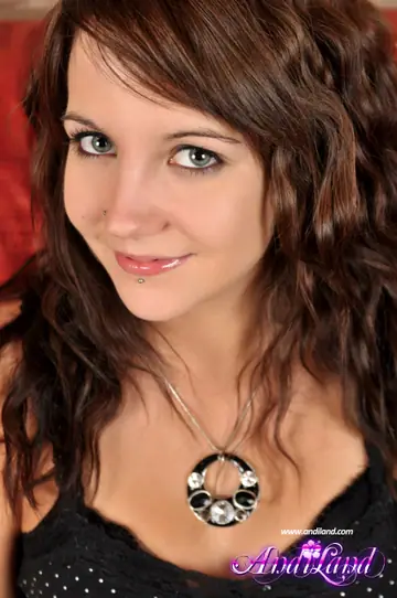 Andi Land – Slim Brunette Undresses Out of Her Jeans and Sneakers in the Bedroom