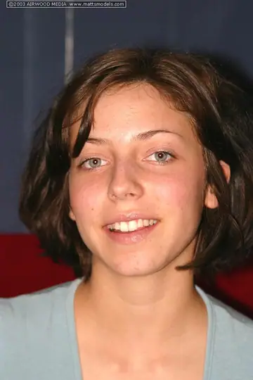 Brunette with Short Hair Pulls Jeans Aside and Spreads Her Hairy Pussy