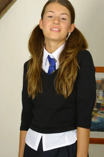 Brunette in Pigtails Strips Out of Her Uniform and Panties