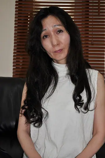 Mature Asian Woman Strips Out of Her Lingerie and Pantyhose for Toy Play