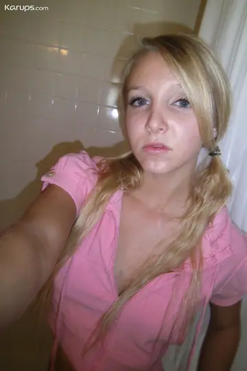 Blonde with Big Tits Spreads Her Shaved Pussy in a Selfie