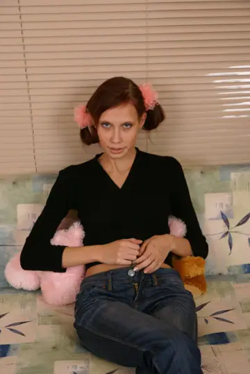 Russian Redhead in Jeans Takes Beer Bottle in Her Pussy