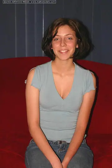 Brunette with Short Hair Strips Out of Her Jeans and Spreads Her Hairy Labia