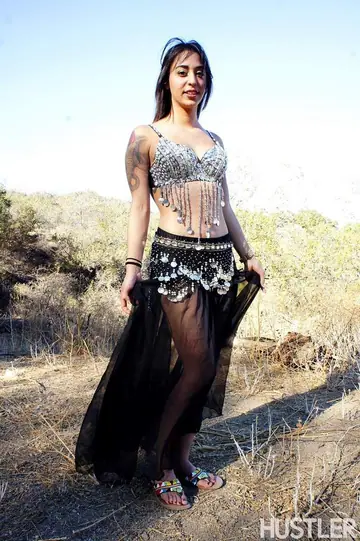 Penelope Stone – Busty Tattooed Brunette Strips Naked in the Forest