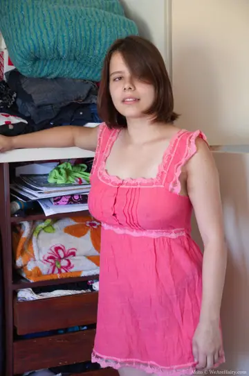 Akito – Latina with Short Hair Lifts Her Skirt to Spread Her Hairy Pussy