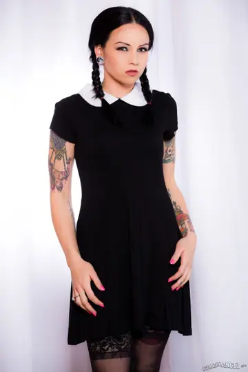Necro Nicki – Brunette in Pigtails Strips Off Her Costume and Spreads Her Legs in Stockings