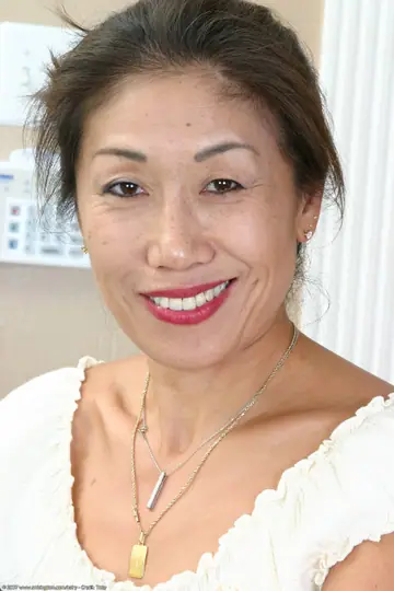 Mature Asian Woman Spreads Her Hairy Pussy