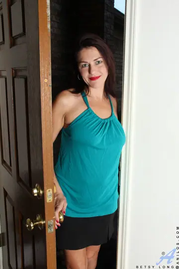 Betsy Long – Brunette MILF Undresses to Show Her Hairy Pussy and Tattoo