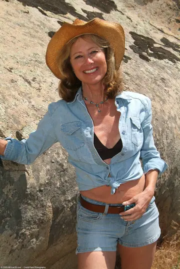 MILF Strips Out of Her Bikini and Rides Cock on Mountain