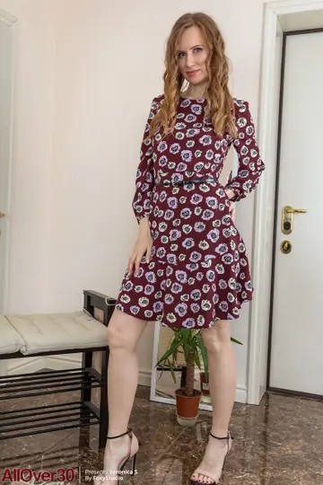 Slim Redhead MILF Strips Out of Her Lingerie and Skirt in Heels