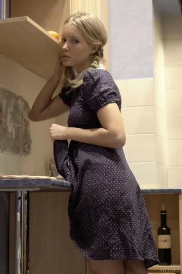 Thick Blonde Lifts Her Skirt and Spreads Her Pussy in the Kitchen