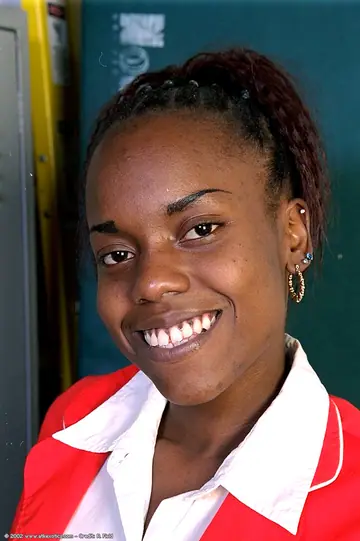 Slim Ebony Babe Undresses and Plays with Her Hairy Pussy