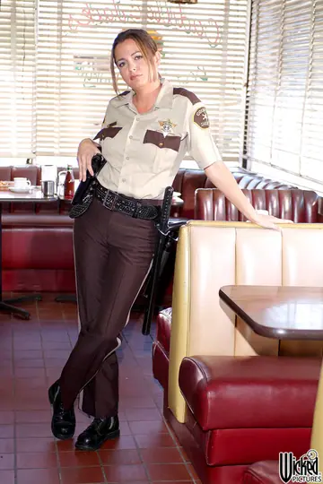 Thick Brunette MILF in Uniform Poses with Big Tits