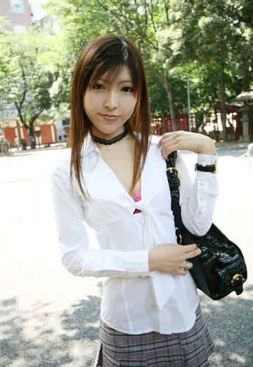 Asian Redhead Strips Out of Her Uniform and Poses Nude