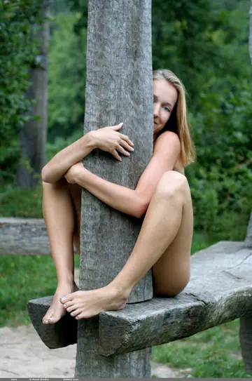 Woman Poses Nude Outdoors and Spreads Her Pussy