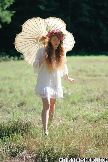 Slim Redhead Strips Out of Her Skirt Outdoors