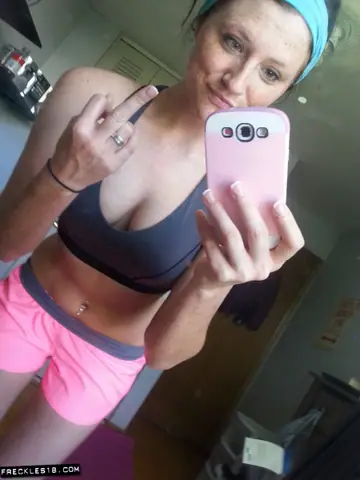 Busty Brunette Takes Mirror Selfie Pulling Shorts and Panties Aside