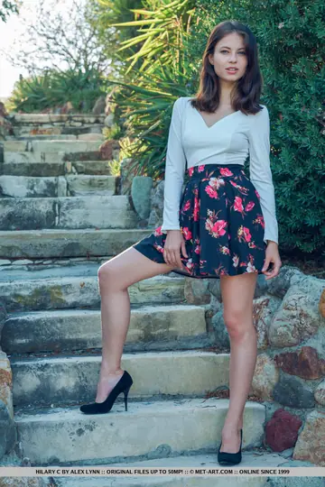 Hilary C – European Brunette Strips Out of Her Skirt Outdoors