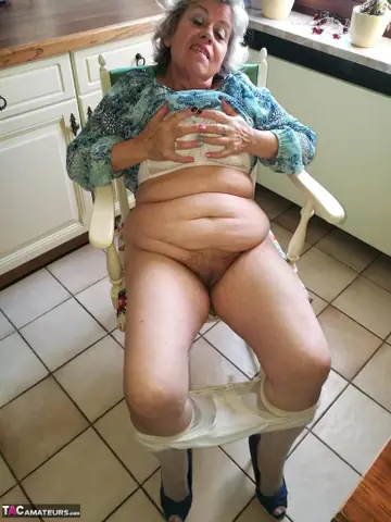 European BBW Masturbates with a Banana on a Kitchen Chair