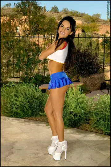Lucia Tovar – Busty Latina MILF Poses in a Skirt and Heels