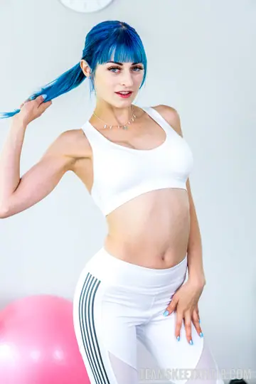 Jewelz Blu – Slim Brunette Poses Clothed and Spreads Her Legs Wide
