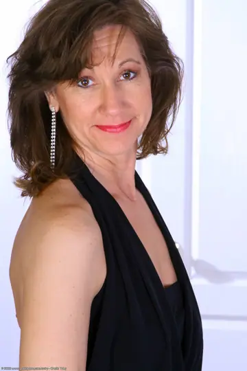 Elle Denay – Mature Brunette Pulls Her Panties Aside and Spreads Her Hairy Pussy