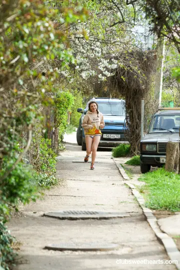Luna Umberley – Tall European Blonde in Pigtails Rides Outdoors in Shorts