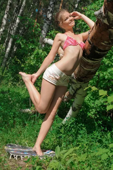 Blonde Strips Out of Her Shorts and Spreads Her Shaved Pussy Outdoors