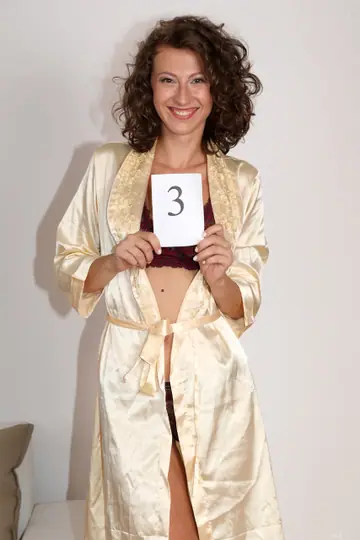 Emylia Argan – Brunette Amateur with Short Curly Hair Spreads Her Legs