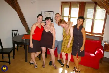 Mature European Women in Skirts Share a Gigolo for Group Sex