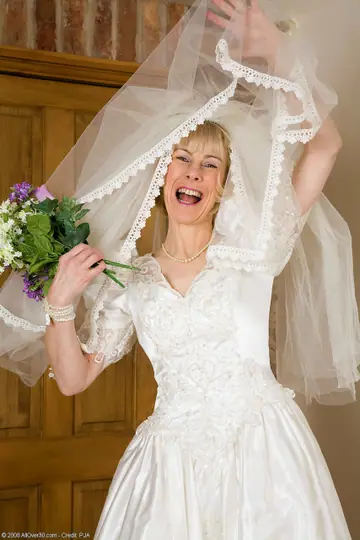 Hazel May – Blonde Bride Strips Off Her Wedding Dress to Show Stockings and Hairy Pussy