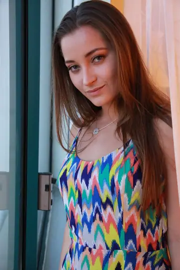 Dani Daniels – Brunette with Big Natural Tits Strips in the Hotel and Spreads Wide