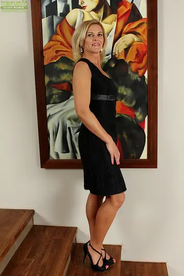 Thick Blonde MILF in Heels Fingers Her Shaved Pussy on the Stairs