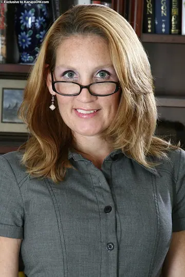 Mature Secretary Strips Out of Her Lingerie in the Office