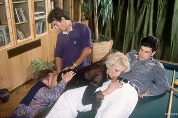 Irina Dener – Mature Blonde Takes a Gangbang on the Table