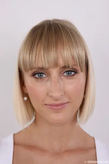 Czech Blonde with Big Tits Strips Out of Her Thong