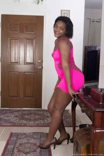 Thick African MILF Lifts Her Dress and Spreads Her Hairy Pussy