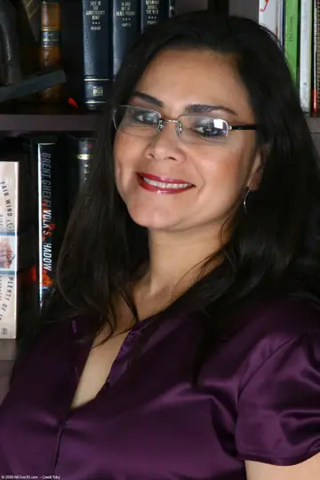 Mature Latina Undresses and Spreads Her Shaved Pussy in the Office
