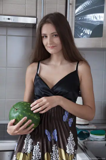 Slim Hairy Woman in Lingerie Spreads Her Pussy in the Kitchen