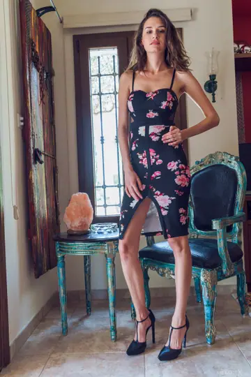 Skinny Brunette in High Heels Strips Out of Her Dress and Fingers Her Pussy