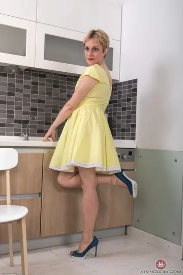 Short-Haired MILF Strips Out of Her Dress in the Kitchen